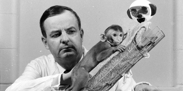 Harry Harlow with a baby rhesus monkey.